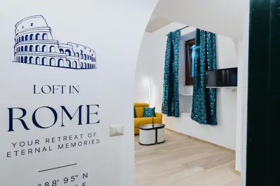 a room with a sign that reads luton rome at Modern loft in central Rome in Rome