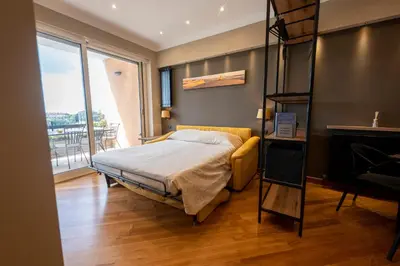 a bedroom with a bunk bed and a ladder at Domus Aurelia Luxury in Rome