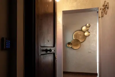 a door with a bunch of onions on the wall at Campo de Fiori Charming Accommodation in Rome