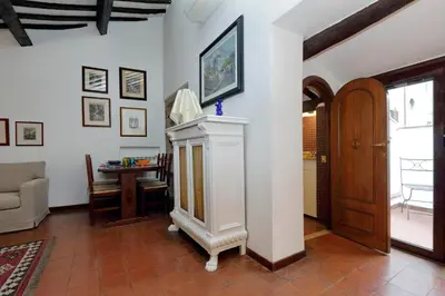 a living room with a couch and a table at Benedetta21 in Rome
