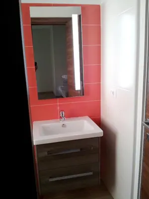 a bathroom with a sink and a mirror at Trastevere Chic in Rome