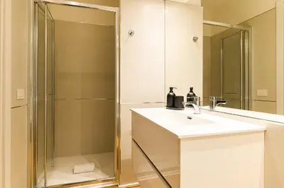a bathroom with a sink and a shower at Central near Vatican by NDP rent in Rome