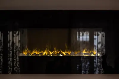 a fire in a fireplace with flames in it at Pantheon Charming Accommodation in Rome