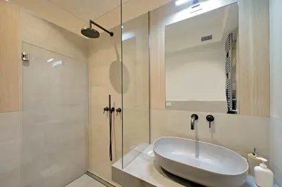 a bathroom with a sink and a shower at YCH-Casa Indipendente in zona Prati in Rome