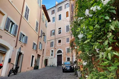 a car parked on a street in front of buildings at Monti Studio in Rome