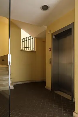 an empty hallway with a door in a building at Studio Margherita in Rome