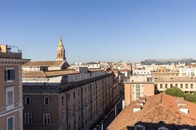 an aerial view of a city with buildings at A due passi dal Colosseo in Rome