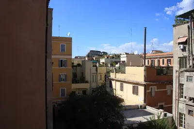 a view of a city from a building at I love Colosseo in Rome