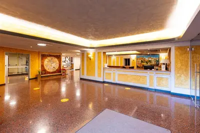 a large lobby with a bar in a building at Aurelia Boutique Apartment in Rome