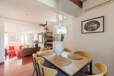a dining room with a table and chairs at iFlat Orient in Rome in Rome