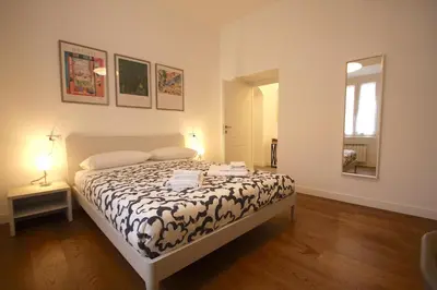 a bedroom with a bed in a room at Risorgimento Holiday Home in Rome
