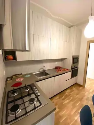 a kitchen with a stove and a counter top at Vacanze Romane in Rome