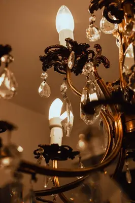 a close up of a chandelier at Golden Luxury Home - San Giovanni - 3 min to Colosseum in Rome