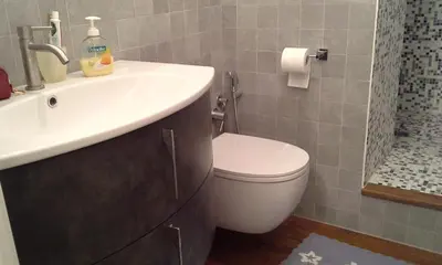 a bathroom with a white sink and a toilet at ROME FOR TWO Campo de' Fiori - your home in Rome in Rome