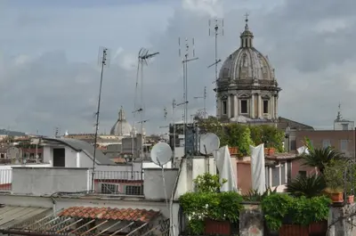 a view of a city with a cathedral in the background at ROME FOR TWO Campo de' Fiori - your home in Rome in Rome