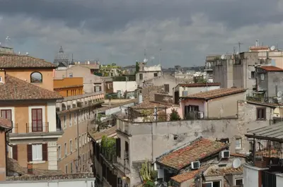 a view of a city with buildings and roofs at ROME FOR TWO Campo de' Fiori - your home in Rome in Rome