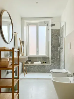 a bathroom with a shower and a sink and a toilet at Grazioso appartamento al Pigneto in Rome