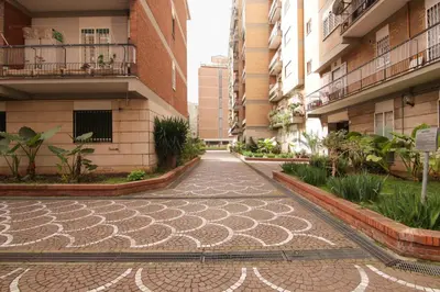 an empty street in an apartment building at Mia Ginger, Stazione Trastevere vicinanze in Rome