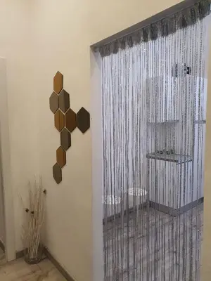 a room with a glass door with a window at Casa Max in Rome