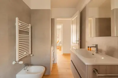 a bathroom with a sink and a toilet at Marisa Home in Rome