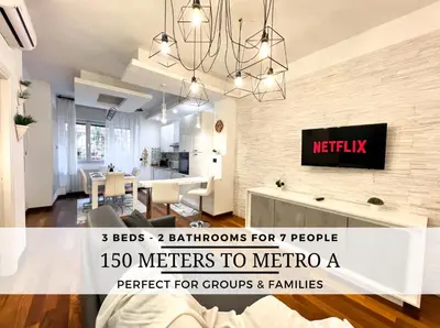 a living room with a kitchen and a dining room at UNIQUE House - 3 Bedrooms & 2 Bathrooms with 4 Beds - 100 meters to the Metro A in Rome