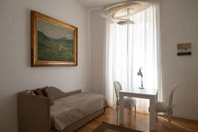a living room with a couch and a table at ART ATELIER VITELLESCHI in Rome