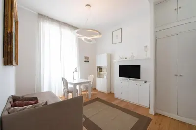 a living room with a couch and a table at ART ATELIER VITELLESCHI in Rome