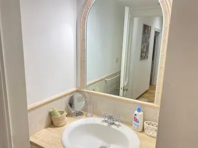 a bathroom with a sink and a mirror at Zaira's House - Largo Argentina Campo de’ fiori in Rome