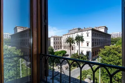 a view of a city from a window at Panoramic Flat Barberini in Rome