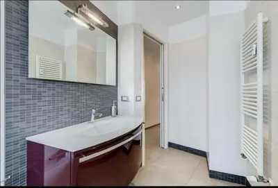 a bathroom with a sink and a mirror at Domus Testaccio in Rome