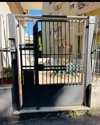 a gate in front of a building at Pamphili212 in Rome