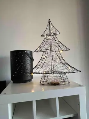 a white table with a christmas tree on it at Miro Home in Rome