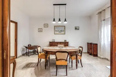 a dining room with a table and chairs at Bellavista - Family&Friends big House-Saint Peter in Rome