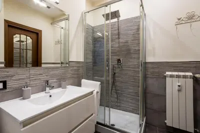 a bathroom with a sink and a shower at My Vatican Home in Rome in Rome