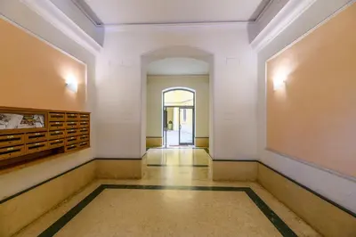 an empty hallway with a door in a building at CasaLu San Pietro in Rome