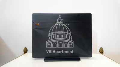 a laptop computer with a vsync appointment sticker on it at Vatican-Balduina Apartment in Rome