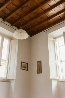 a bathroom with a shower and a sink and a toilet at Historic Apartment Via dei Coronari, Piazza Navona in Rome