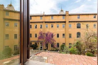a view of a building from a window at Rome as you feel - Luxury Cappellari Apartment in Rome