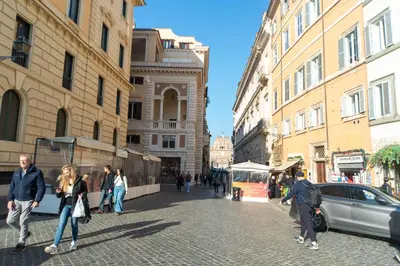 a group of people walking down a city street at Banchi Nuovi, modern and cozy apartment in Rome