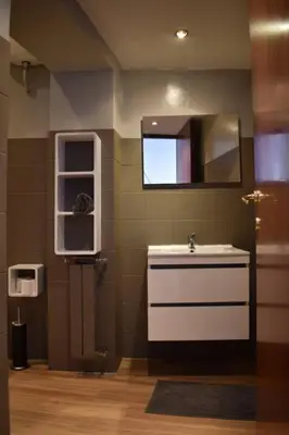 a bathroom with a sink and a mirror at CAMERA con VISTA in Rome