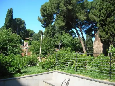 a skateboard ramp with a fence in a park at Chiara Stella Guest House in Rome