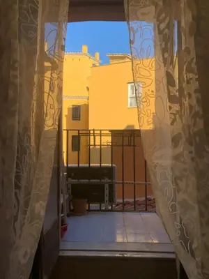 a view from a window of a balcony at BQA San Crisogono Apartments Rome-Trastevere in Rome