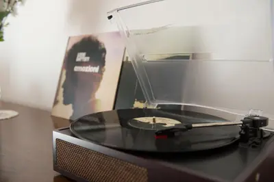 a record player sitting on top of a table at BaccaLia Home in Rome