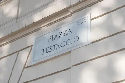 a sign on the side of a building at Testaccio Industrial Loft in Rome