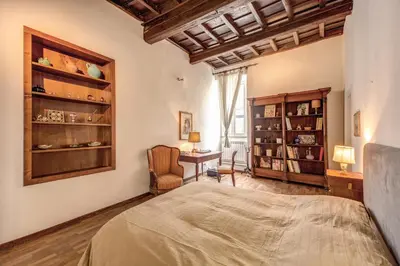 a bedroom with a bed and a desk at Borgo Pio Passetto Papale in Rome