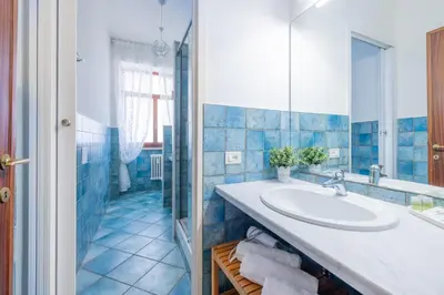 a bathroom with a sink and a shower at Vista Indimenticabile sulla Cupola di S. Pietro in Rome