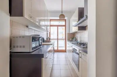 a kitchen with a counter with a microwave on it at Vista Indimenticabile sulla Cupola di S. Pietro in Rome