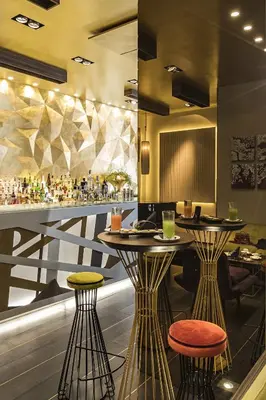 a restaurant with two tables and a bar at Palazzo Navona Hotel in Rome