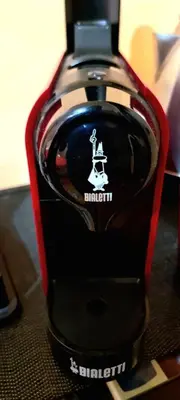 a close up of a black and red cell phone at Wanderlust Pietralata B&B in Rome