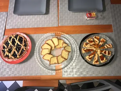 a table with three plates of pies on it at Le Stanze di Pietro in Rome